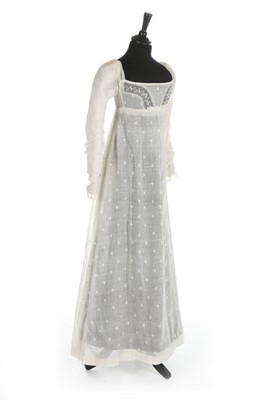 Lot 36 - A sprigged muslin dress, circa 1800, the...