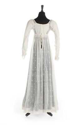 Lot 36 - A sprigged muslin dress, circa 1800, the...