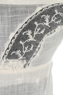 Lot 36 - A sprigged muslin dress, circa 1800, the...