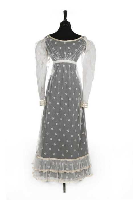 Lot 20 - A sprigged and embroidered tulle dress, circa...