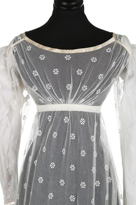 Lot 20 - A sprigged and embroidered tulle dress, circa...