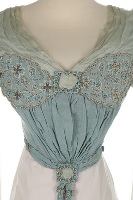 Lot 40 - A Liberty & Co Ltd embroidered and beaded...