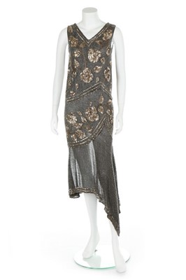 Lot 67 - A black and gold muslin flapper dress, circa...