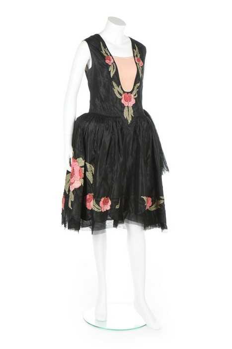 Lot 47 - A good ribbon-worked black taffeta robe de...