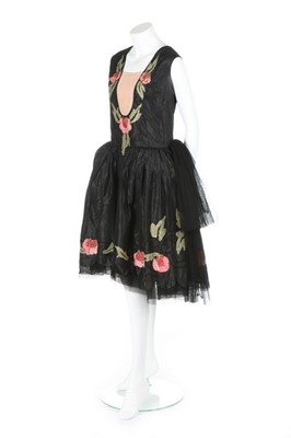 Lot 47 - A good ribbon-worked black taffeta robe de...