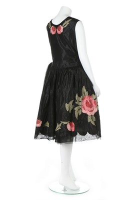 Lot 47 - A good ribbon-worked black taffeta robe de...