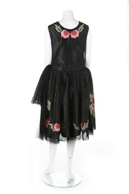 Lot 47 - A good ribbon-worked black taffeta robe de...