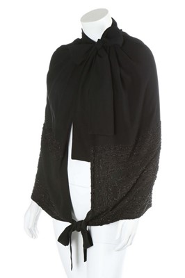Lot 59 - A Gabrielle Chanel beaded silk crpe capelet,...