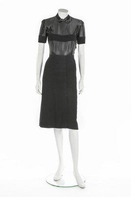 Lot 62 - A rare and early Balenciaga couture black wool...