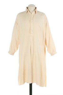 Lot 82 - Winston Churchill's cream silk night-shirt,...