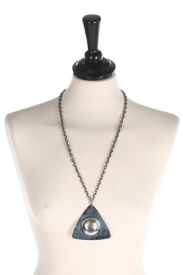 Lot 118 - A Pierre Cardin tri-angular pendant necklace,...