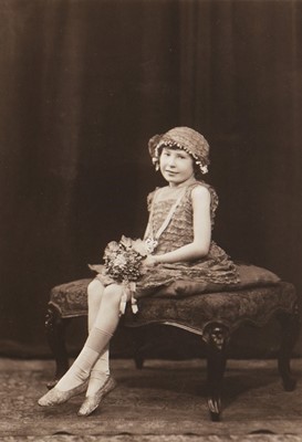 Lot 139 - A little girl's gold lace dress, late...