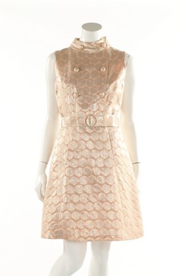 Lot 115 - Two lamé cocktail dresses, mid 1960s, one of...