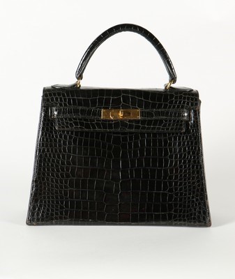 Lot 13 - An Hermès black crocodile Kelly, late 1960s,...