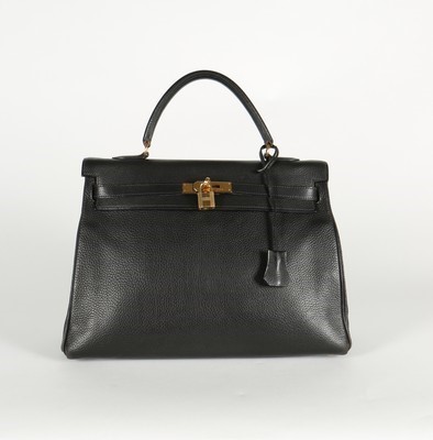Lot 17 - An Hermès soft black leather Kelly, 1999,...