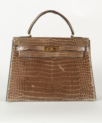 Lot 11 - An Hermès grey crocodile Kelly bag, circa 1965,...