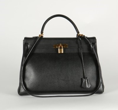 Lot 6 - An Hermès black Fjord leather Kelly bag, 1993,...