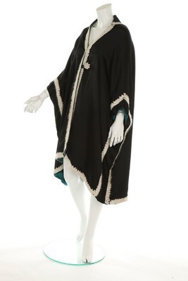 Lot 72 - A rare Lucile black satin evening cape, circa...