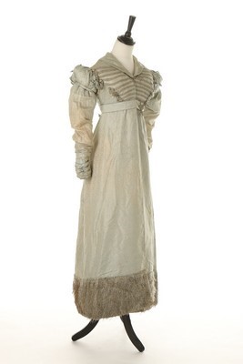 Lot 31 - An ice-blue figured silk pelisse robe, circa...
