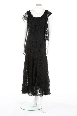 Lot 69 - A Chanel couture bias-cut lace 'little black'...