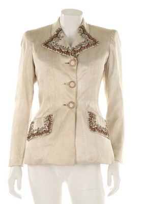 Lot 96 - A Schiaparelli figured ivory satin evening...