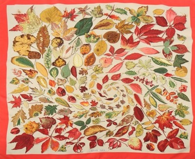 Lot 46 - An Hermès autumn-leaf print silk scarf, with...