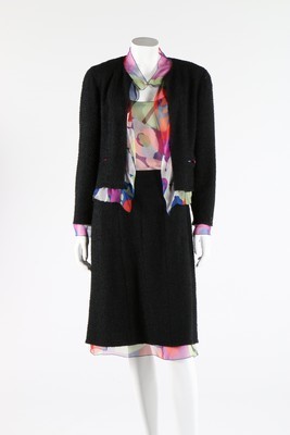Lot 18 - A Chanel wool and printed silk ensemble, 2000,...