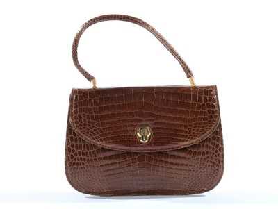 Lot 108 - A Gucci brown crocodile handbag, 1960s,...