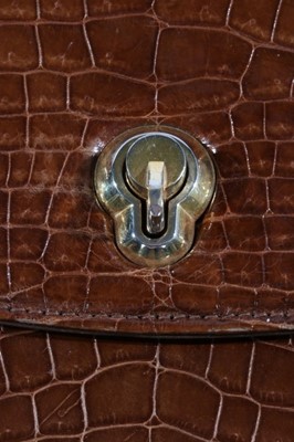 Lot 108 - A Gucci brown crocodile handbag, 1960s,...