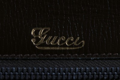 Lot 108 - A Gucci brown crocodile handbag, 1960s,...