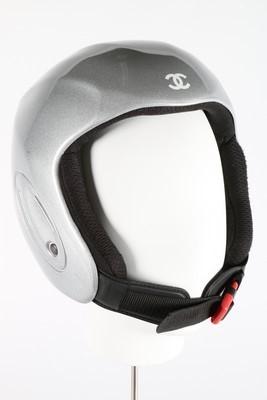 Lot 26 - A Chanel ski helmet, with silver finish, CC...