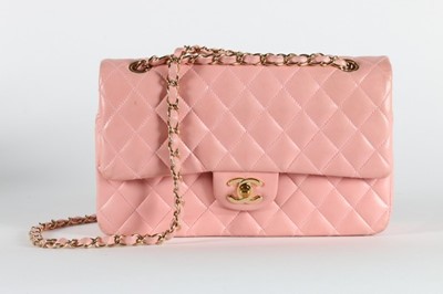 Lot 22 - A Chanel pink leather double flap bag, stamped...