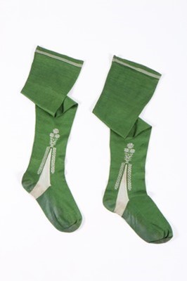 Lot 40 - A pair of frame-knitted green silk stockings,...