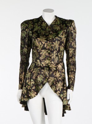 Lot 68 - A Paquin stencilled black satin evening jacket,...