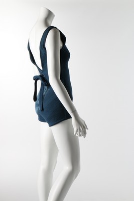 Lot 76 - A rare Schiaparelli knitted blue wool swimsuit,...