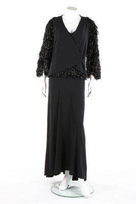 Lot 86 - A Lucien Lelong black crpe and fringed...