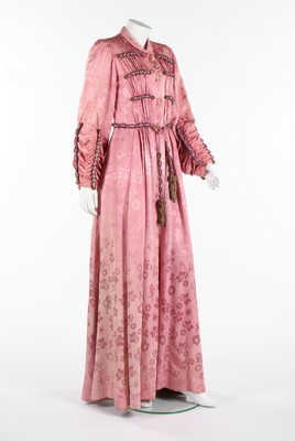 Lot 85 - A rare Schiaparelli pink damask evening coat,...