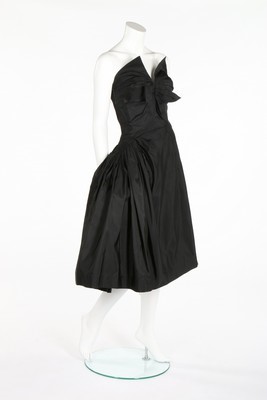 Lot 93 - A Madame Grs couture black taffeta cocktail...