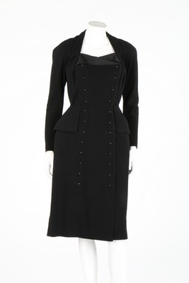 Lot 101 - A Pierre Balmain couture black wool crpe...