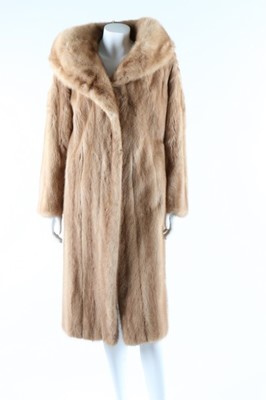 Lot 57 - A Schiaparelli light brown mink coat, late...