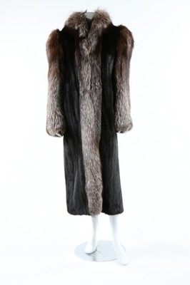 Lot 58 - A black mink and fox fur coat, 1980s, labelled...