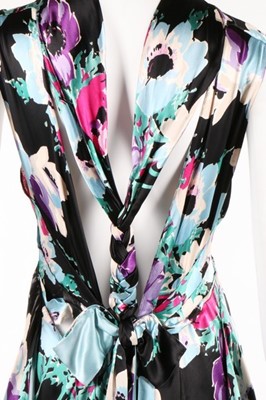 Lot 61 - A good floral printed satin bias-cut evening...