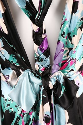Lot 61 - A good floral printed satin bias-cut evening...