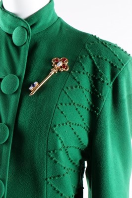 Lot 62 - A full-length green wool evening coat with...