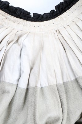 Lot 63 - An unusual black figured silk cape with...