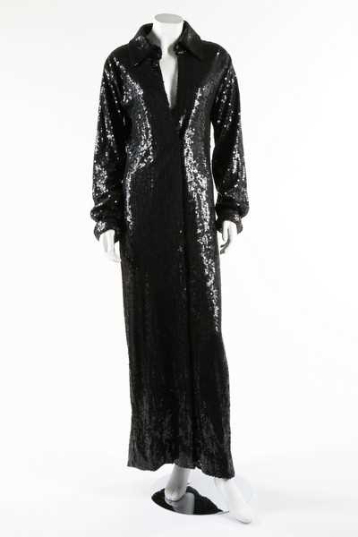 Lot 78 - A Halston black sequined maxi coat, probably...