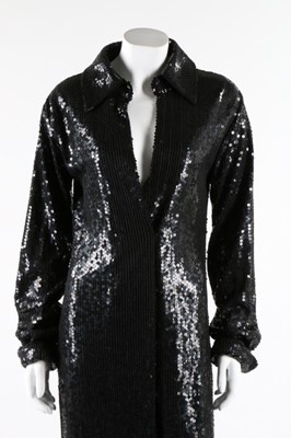 Lot 78 - A Halston black sequined maxi coat, probably...