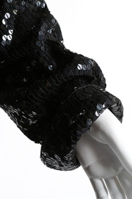 Lot 78 - A Halston black sequined maxi coat, probably...