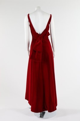Lot 85 - A Fontana Sisters burgundy velvet evening gown,...