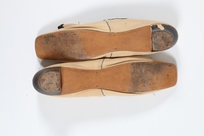 Lot 87 - A pair of Gaudinot pale apricot linen summer...